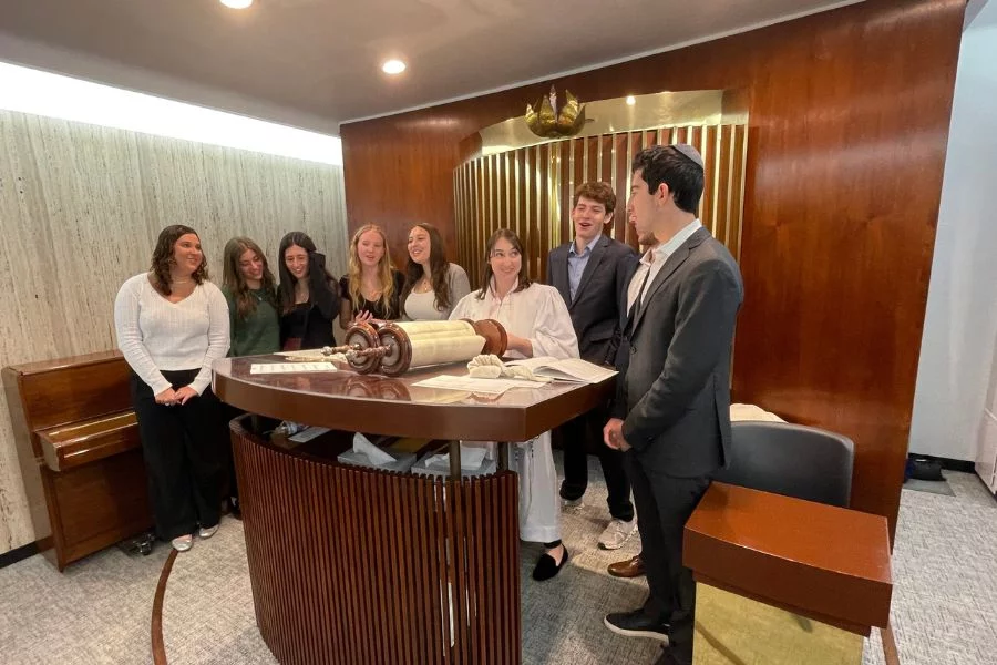 teens in the chapel with rabbi